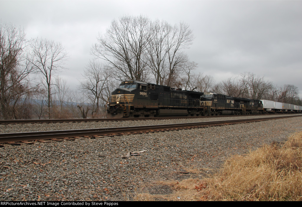 NS 9684 leads train 21M through MP 116